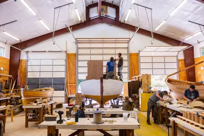 Students work with instructors at the Northwest School of Wooden Boatbuilding, in Port Townsend, Washington on July 25, 2023. The NSWB has been in operation of over 40 years, teaching students wooden boatbuilding skills and helping launch careers in that industry.